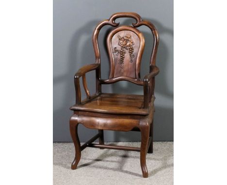 A late 19th/early 20th Century Chinese rosewood open armchair, the shaped back inset with panel carved with fruiting vine, wi