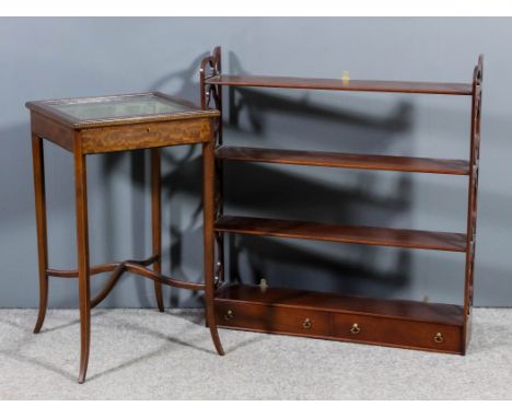 An Edwardian mahogany square display table inlaid with stringings and chequered bandings, with glazed lifting lid, on square 