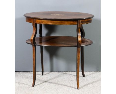A late Victorian rosewood oval two tier etagere inlaid with stringings, the top inlaid with central oval panel of scroll orna