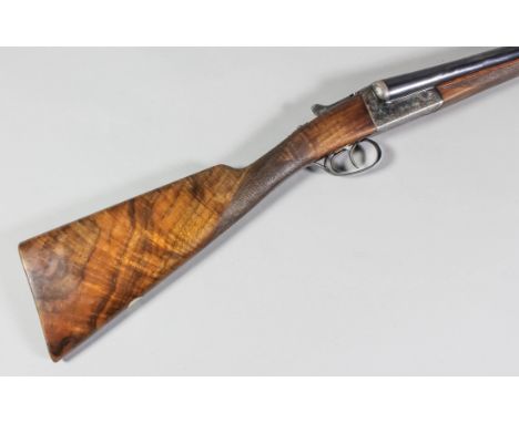 A good 12 bore side by side Model 25 box lock shotgun by A.Y.A., Serial No. 424455, with 25ins blued steel barrels with Churc