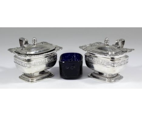 A pair of George III silver rectangular mustard pots, the domed covers with acorn pattern finials, gadroon and leaf scroll ca