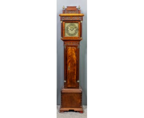 A walnut cased "Granddaughter" longcase clock, the 7ins square brass dial with chapter ring with Roman numerals and matted di