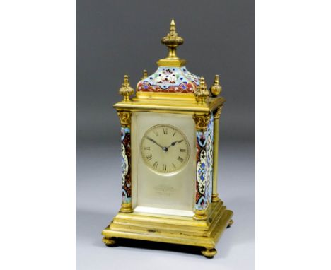 A late 19th/early 20th Century French gilt brass and champleve enamel cased mantel clock by E.M. & Co, No. 4453, the 2.25ins 
