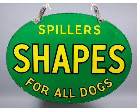 An early 20th Century enamel oval double sided hanging advertising sign for "Spillers" - One side worded "Shapes for all Dogs