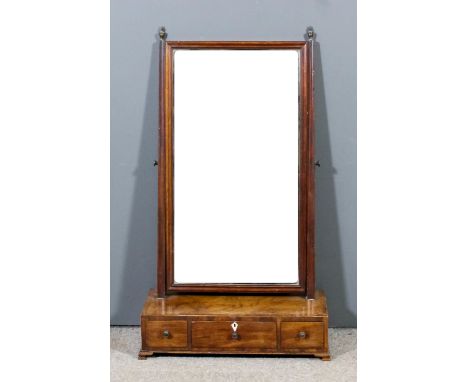 A mahogany framed rectangular toilet mirror of Georgian design, the moulded frame now inset with bevelled mirror panel on tap