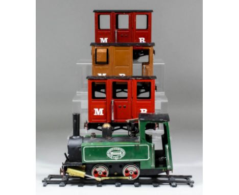A Mamod slide valve steam engine based on the Brunel and Centurion models, two passenger carriages and two freight wagons, an