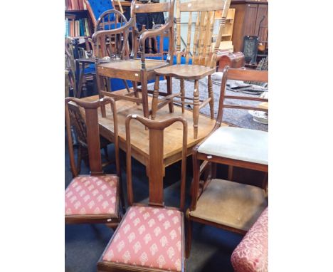 AN EARLY 19TH CENTURY COUNTRY ARMCHAIR with boarded seat, a single Ercol chair, and other chairs