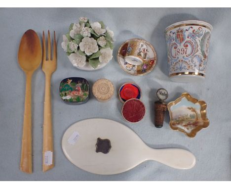 A MINIATURE DRESDEN CUP AND SAUCER a Coalport painted pin tray, an 1897 Jubilee enamel beaker, 'Whiskey' bottle stopper and o