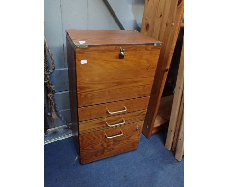 A WOODEN TOOL CHEST OR FILING CABINET with lift-up top section, and lockable lower compartment, and two drawers 39cm wide