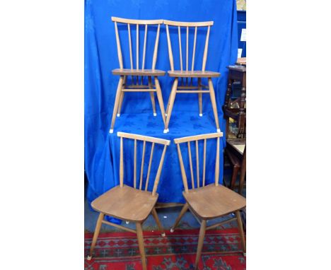 A SET OF FOUR ERCOL STICK BACK CHAIRS 79cm high (4)