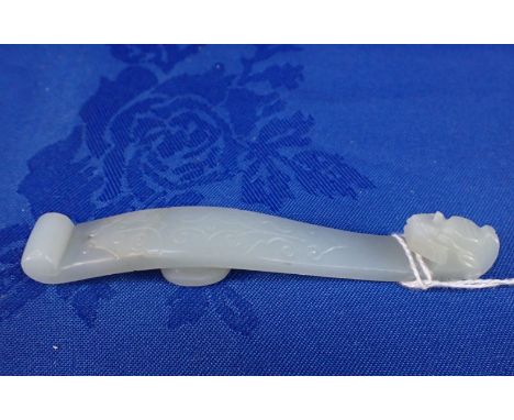 A CHINESE PALE CELADON JADE BELT HOOK 11cm long