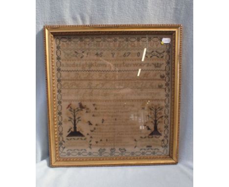 A LATE 19TH CENTURY NEEDLEWORK SAMPLER by Harriett Bigg, 1880, with homely verse flanked by trees and flowers 44 x 42cm frame