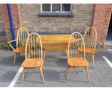AN ERCOL DROP-LEAF DINING TABLE AND FOUR CHAIRS (in fair order, some chair joints need tightening, scuffs and scratches, some