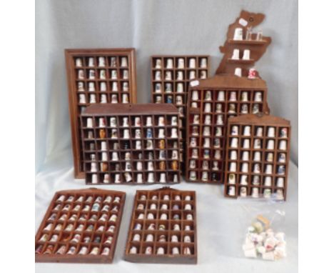 A QUANTITY OF COLLECTOR'S THIMBLES mostly ceramic, and wall display boxes