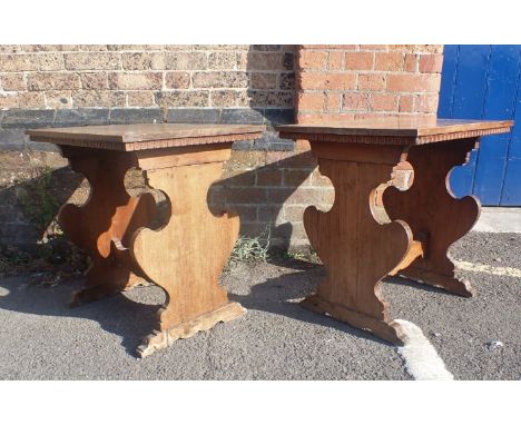 A PAIR OF ITALIAN CHESTNUT AND FRUITWOOD LAMP OR OCCASIONAL TABLES with vase profile supports, each 62 x 44cm, 58cm high