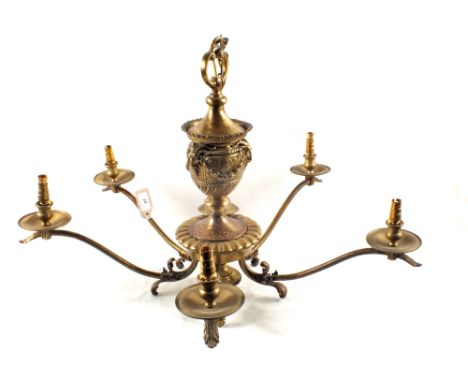 A pair of heavy five branch Brass light fittings with acanthus and rams head decoration