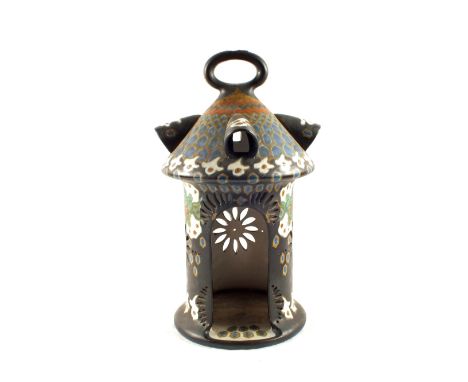 A large Gouda floral candle lantern (cracks)