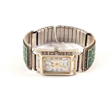 A lady's wristwatch with part Silver and green enamel strap