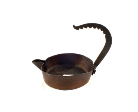 A 17th Century Copper rush light holder
