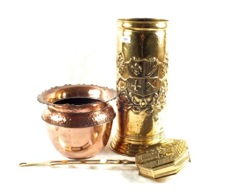 A Brass stick stand embossed with Coat and Arms, embossed Brass chestnut roaster and an Arts and Crafts Copper jardinière