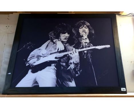 A large framed print of Mick Jagger and Bill Wyman 110cm x 87cm COLLECT ONLY