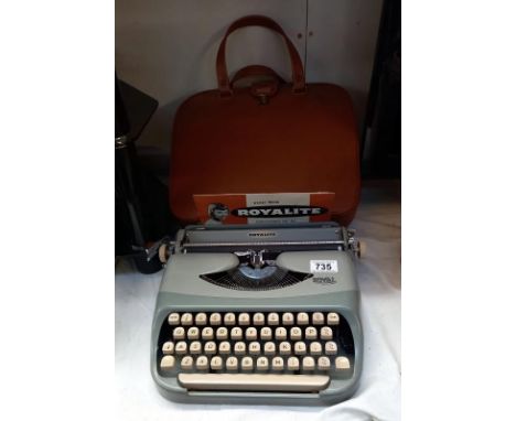 A vintage Royal Royalite typewriter with travel case
