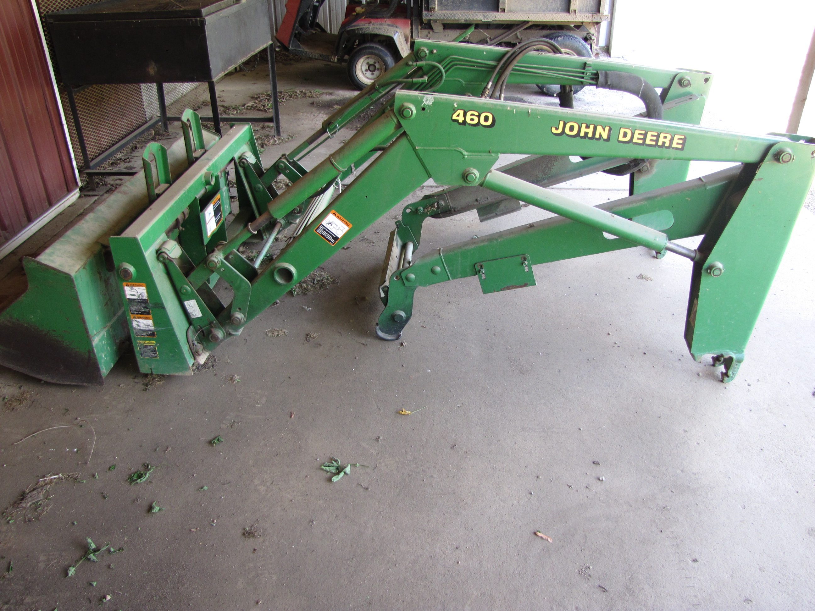 John Deere 460 Loader Attachment, includes 5’ bucket and pallet forks