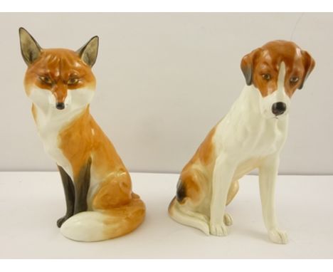TWO ROYAL WORCESTER BONE CHINA FIGURES AND MODELS if a hound seated, model 2994, 18cm high and a fox also seated, model 18cm 