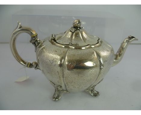 JAMES DIXON & SONS A VICTORIAN SILVER MELON PATTERN TEAPOT having hinged lid with fruit knop, foliate scroll engraved, lobed 