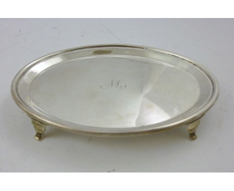 JAMES DIXON &amp; SONS A GEORGIAN STYLE OVAL SILVER TEAPOT STAND centre monogrammed W, Birmingham 1930, 150g 