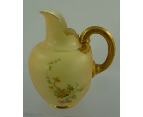 AN EARLY 20TH CENTURY ROYAL WORCESTER BLUSH IVORY GROUND JUG, having hand painted floral decoration, with gilded handle, shap