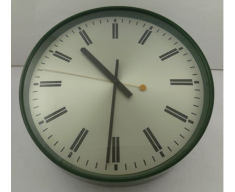 ROBERT WELCH FOR SMITHS INDUSTRIES LTD. A WALL CLOCK dated 1977, green plastic case with electric synchronous movement, silve