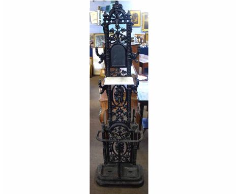 Victorian cast iron free-standing hall stand in the Coalbrookdale manner, fitted with five heavy coat hooks with arched top i