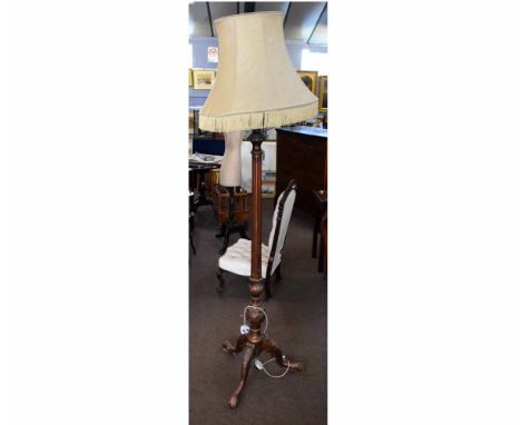 20th century partially gilded standard lamp with reeded column and carved tripod base together with cream tasselled shade, 19
