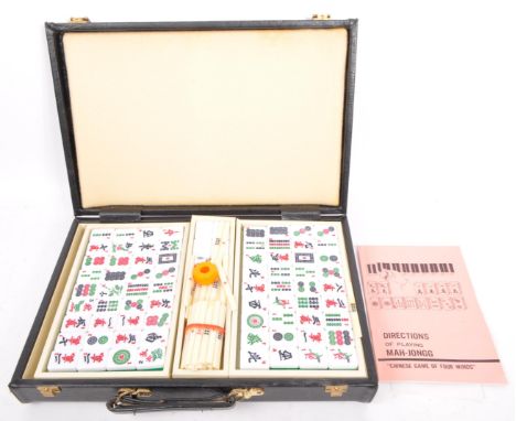 Mah-Jongg / mah-jong - Chinese tile based board game. With counters, instruction manual and sticks. 1988. In a Bugatti case.