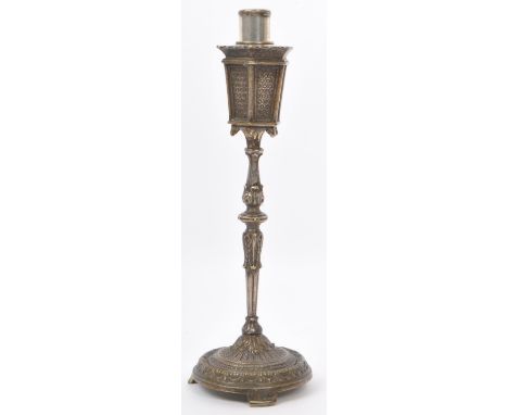 An early 20th century novelty cast white metal / electroplate table lighter in the form of a Victorian hexagonal ornate stree