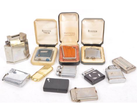 A collection of twelve 20th century lighters to include pocket lighters by; Ronson x 4 to include Ronson Viking (boxed), Thor