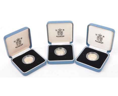 A set of four The Royal Mint United Kingdom silver proof one pound / £1 coins. To include; Ornamental royal arms&nbsp;- 2008,