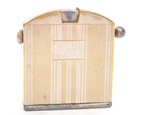 A 1930's German engine turned pocket cigarette lighter by Kaschie, model No. 33 designed by Karl Schieder.&nbsp;Measures; 5cm