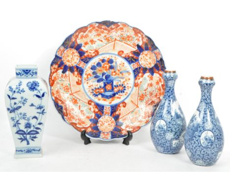 A collection of 19th century and later ceramics to include a Japanese Meiji period hand painted charger dish, a Portuguese bl