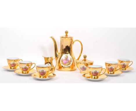 A mid century decorative German Rheinpfalz Hartporzellan gilt floral tea service comprising, cups, saucers, sugar bowl, cream