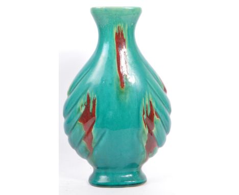 A 20th century studio art Chinese green vase having blue crackle glaze with abstracted strokes of red to body and being of bu