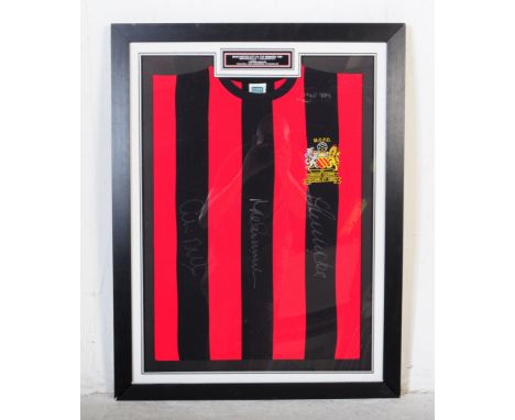 A large vintage 20th century Manchester City Football club shirt, 1969 long sleeves red and black stripes FA cup final winner