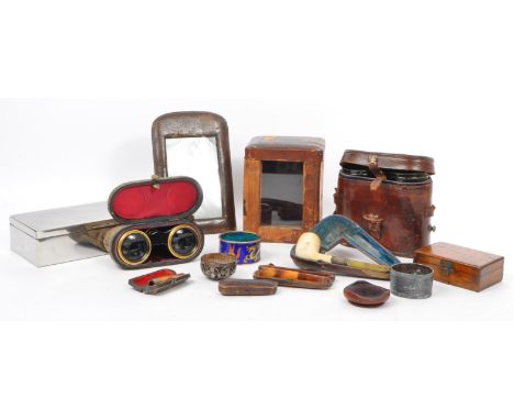 A collection of items to include leather cased carriage clock case, Army &amp; Navy leather cased binoculars, opera glasses i