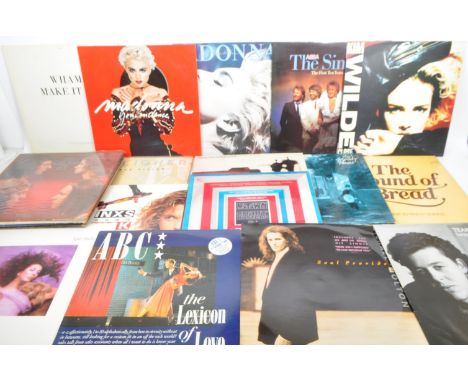 A collection of vintage 20th century LP long play vinyl record albums. To include, The moody blues, Steely Dan, Foreigner, In