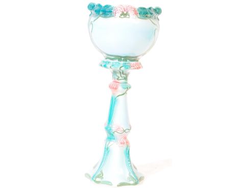An early 20th century floor standing turquoise blue majolica planter and stand in the Art Nouveau manner. The stand and plant