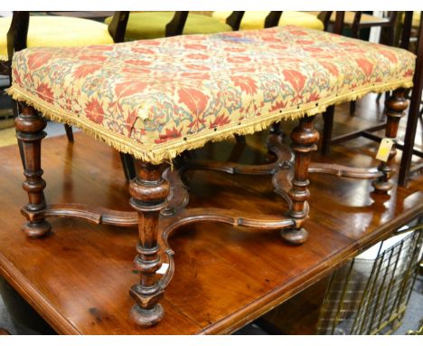^ A William & Mary style stool on turned legs with flattened double stretcher and Persian cotton design upholstery, 101cm wid