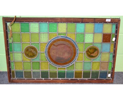 19th century stained glass panel with portrait medallions