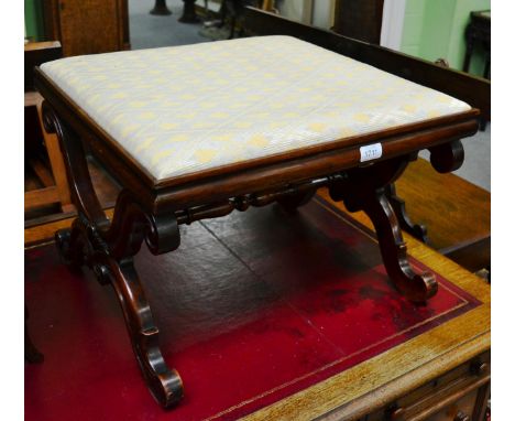 * A Victorian rosewood X-framed dressing stool with drop in seat