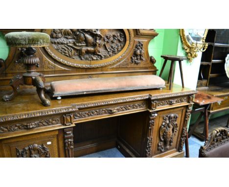 A Victorian revolving piano stool, a Victorian double footstool, a carved oak octagonal shaped stool, a mahogany side table w